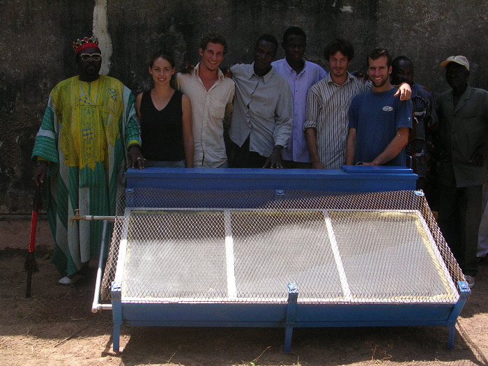 The district chief, Gwenola, Olivier, Ismaël, a friend, Daniel & Jan in front of the water-heater