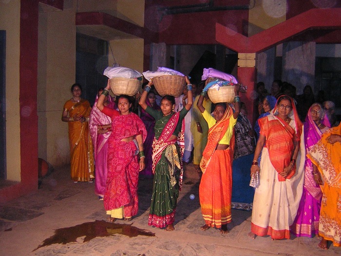 Women carrying presents