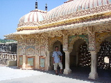 Guillaume in front of a pavilion