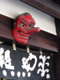 Mask at the entrance of a shop