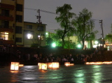 Lanterns floating on the Asanogawa River during a festival