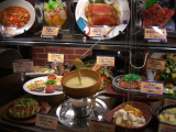 Plastic meals in front of a restaurant