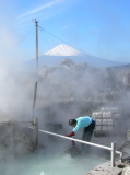 Egg cooking in boiling mud