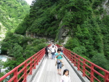 Walkers on a bridge