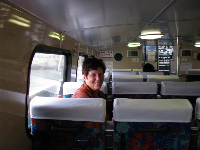 Michèle in the shuttle boat for Taketomi-jima, small island near Iriomote-jima