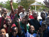 Young Namibian people at a bus stop