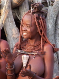 Woman wearing the ohumba shell, symbol of fertility